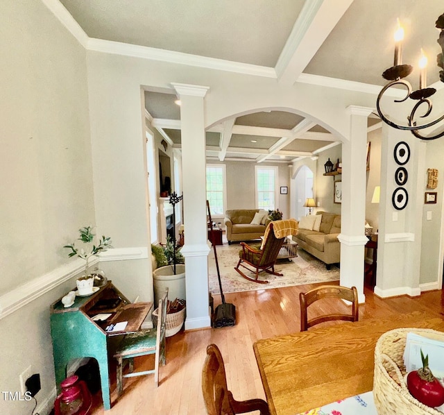 327 Beavertail Rd, Henderson, NC 27537 - dining room featuring arched walkways, coffered ceiling, wood finished floors, beam ceiling, and ornamental molding