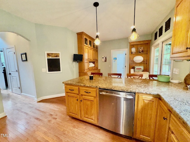 327 Beavertail Rd, Henderson, NC 27537 - kitchen featuring stainless steel dishwasher, a peninsula, arched walkways, light wood-style flooring, and hanging light fixtures