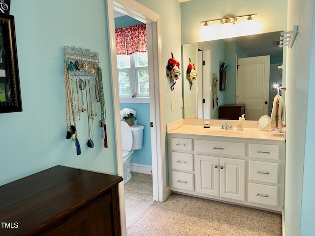 327 Beavertail Rd, Henderson, NC 27537 - bathroom featuring toilet and vanity