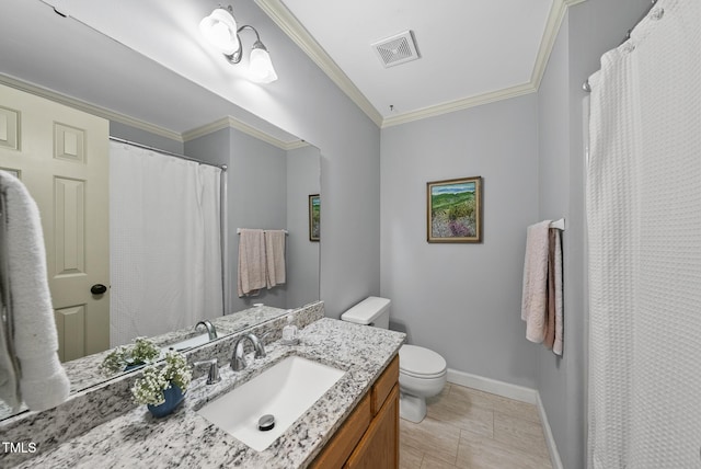 bathroom with baseboards, toilet, ornamental molding, and vanity