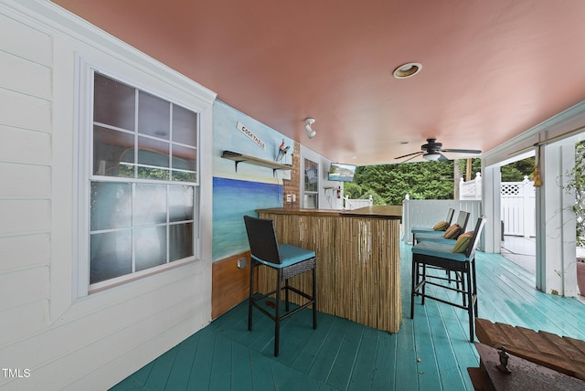 wooden terrace with ceiling fan