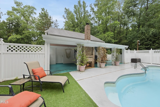view of pool featuring a patio