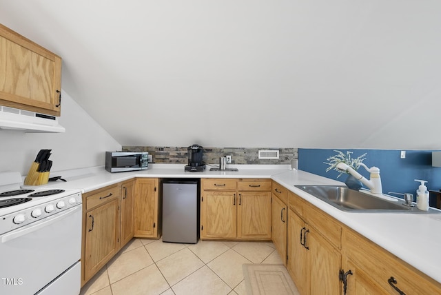 kitchen with white electric range oven, under cabinet range hood, stainless steel microwave, a sink, and lofted ceiling