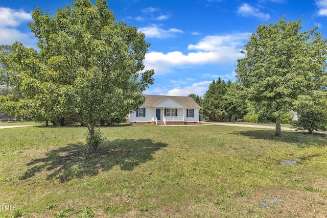 view of front of property with a front lawn and covered porch