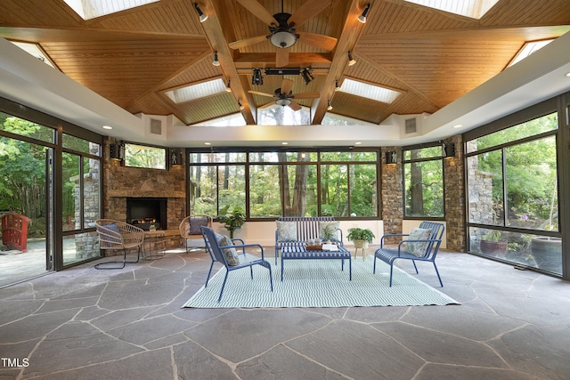 107 Silo Dr, Chapel Hill, NC 27514 - sunroom / solarium with a skylight, a ceiling fan, an outdoor living space with a fireplace, and healthy amount of natural light