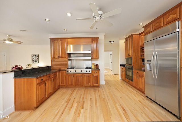 107 Silo Dr, Chapel Hill, NC 27514 - kitchen featuring black appliances, exhaust hood, ceiling fan, brown cabinetry, and crown molding