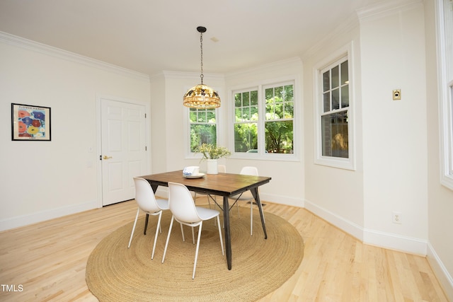 107 Silo Dr, Chapel Hill, NC 27514 - dining room featuring light wood-style floors, baseboards, and crown molding