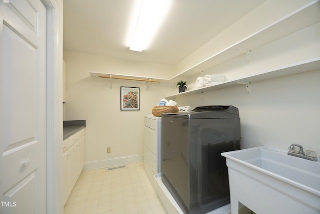 107 Silo Dr, Chapel Hill, NC 27514 - laundry room with washing machine and clothes dryer and baseboards
