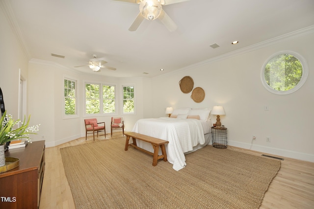 107 Silo Dr, Chapel Hill, NC 27514 - bedroom featuring light wood-style flooring, crown molding, baseboards, and a ceiling fan