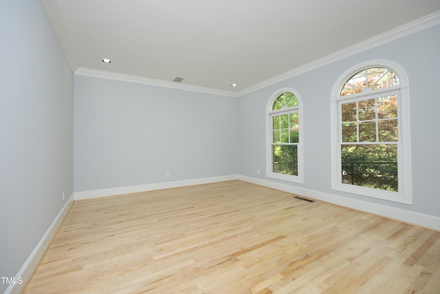 107 Silo Dr, Chapel Hill, NC 27514 - unfurnished room with light wood finished floors, baseboards, crown molding, and recessed lighting