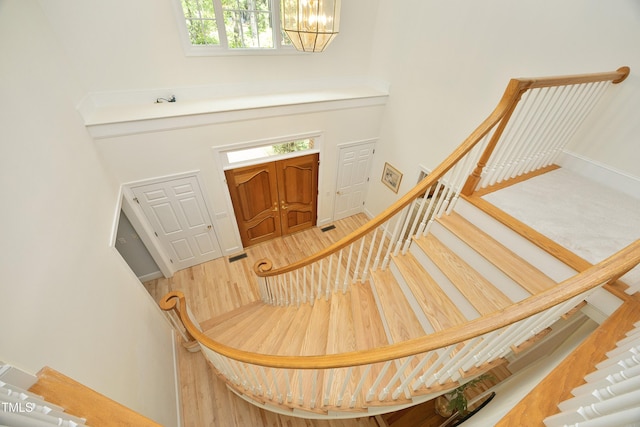 107 Silo Dr, Chapel Hill, NC 27514 - entrance foyer featuring a chandelier, a high ceiling, and stairs