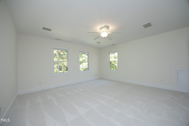 107 Silo Dr, Chapel Hill, NC 27514 - spare room featuring light carpet, ceiling fan, and baseboards