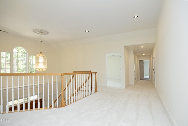 107 Silo Dr, Chapel Hill, NC 27514 - corridor featuring an upstairs landing, attic access, carpet flooring, recessed lighting, and a chandelier