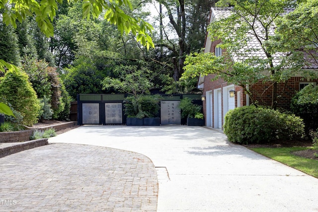 107 Silo Dr, Chapel Hill, NC 27514 - garage with driveway and a gate