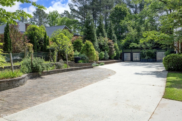 107 Silo Dr, Chapel Hill, NC 27514 - exterior space with driveway, fence, and a garage