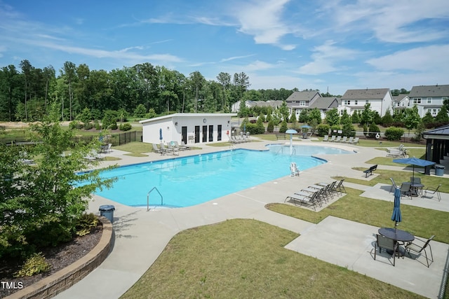 2501 Impulsion Dr, New Hill, NC 27562 - community pool with a patio