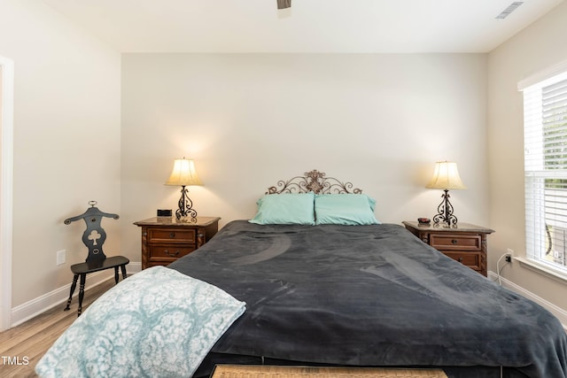 2501 Impulsion Dr, New Hill, NC 27562 - bedroom with wood finished floors, baseboards, and ceiling fan