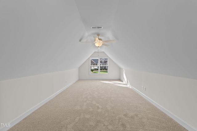 525 Allesandra Dr, Clayton, NC 27527 - additional living space featuring lofted ceiling, a ceiling fan, carpet floors, and baseboards