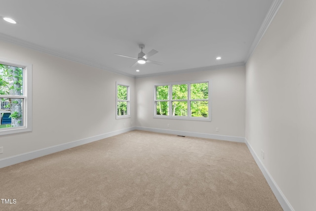 525 Allesandra Dr, Clayton, NC 27527 - empty room featuring crown molding, ceiling fan, light colored carpet, recessed lighting, and baseboards