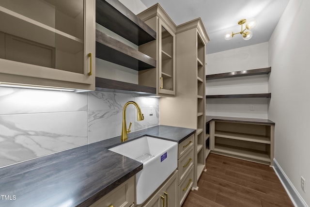 525 Allesandra Dr, Clayton, NC 27527 - kitchen with a sink, dark countertops, open shelves, and dark wood-style floors