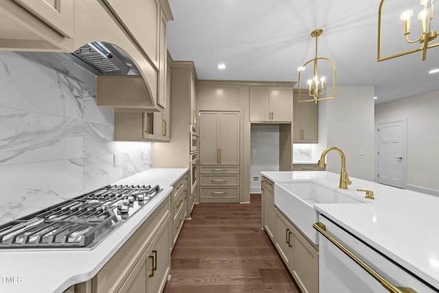 525 Allesandra Dr, Clayton, NC 27527 - kitchen featuring a chandelier, light countertops, backsplash, stainless steel gas cooktop, and recessed lighting