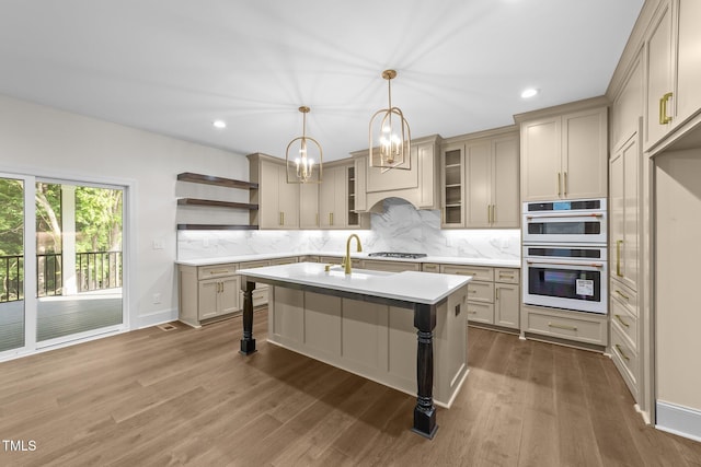 525 Allesandra Dr, Clayton, NC 27527 - kitchen featuring a sink, light countertops, open shelves, recessed lighting, and tasteful backsplash