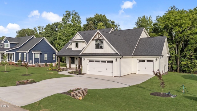 525 Allesandra Dr, Clayton, NC 27527 - modern inspired farmhouse with board and batten siding, concrete driveway, a garage, a front lawn, and a shingled roof