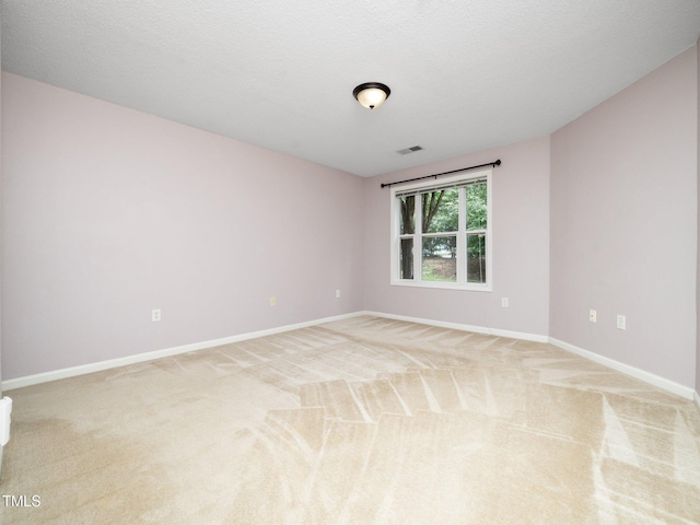 1911 Falls Landing Dr Unit 106, Raleigh, NC 27614 - unfurnished room with baseboards and light colored carpet