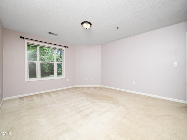 1911 Falls Landing Dr Unit 106, Raleigh, NC 27614 - spare room with light carpet and baseboards
