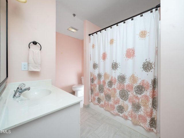 1911 Falls Landing Dr Unit 106, Raleigh, NC 27614 - bathroom featuring vanity, toilet, and shower / bathtub combination with curtain