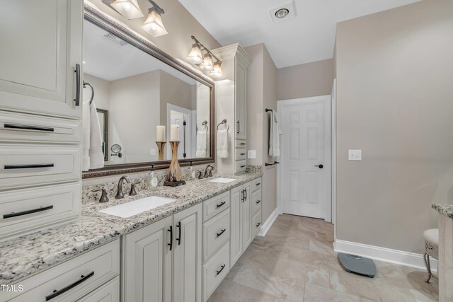 4802 Glenmist Ct, Raleigh, NC 27612 - bathroom with baseboards and double vanity