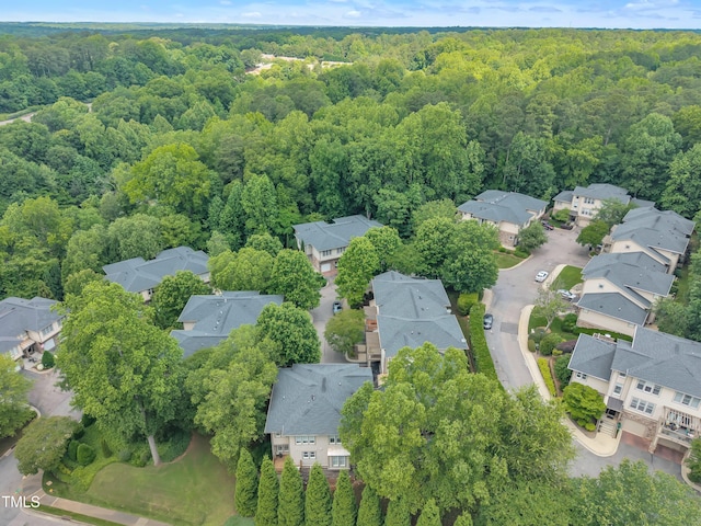 4802 Glenmist Ct, Raleigh, NC 27612 - aerial overview of property's location featuring a heavily wooded area and nearby suburban area