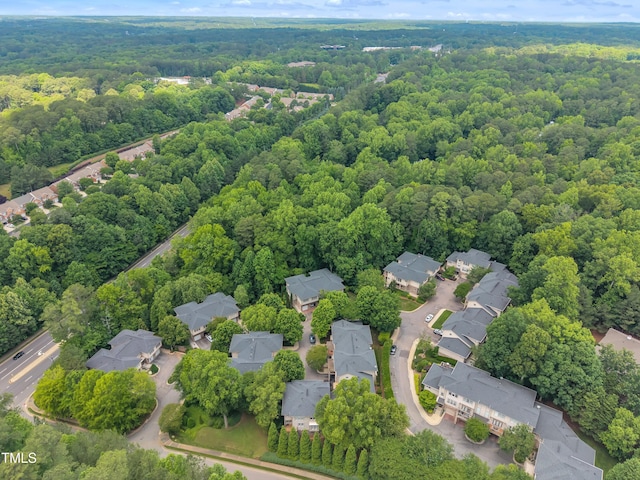 4802 Glenmist Ct, Raleigh, NC 27612 - aerial overview of property's location with a heavily wooded area and nearby suburban area