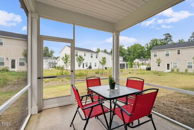 209 White Farm Dr, Wendell, NC 27591 - sunroom with outdoor dining area, a residential view, and healthy amount of natural light