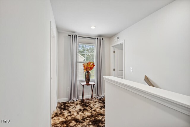209 White Farm Dr, Wendell, NC 27591 - corridor with carpet flooring and baseboards