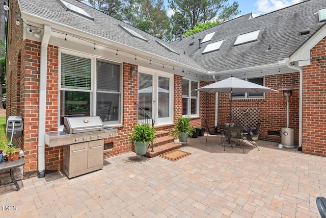 view of patio featuring grilling area and entry steps