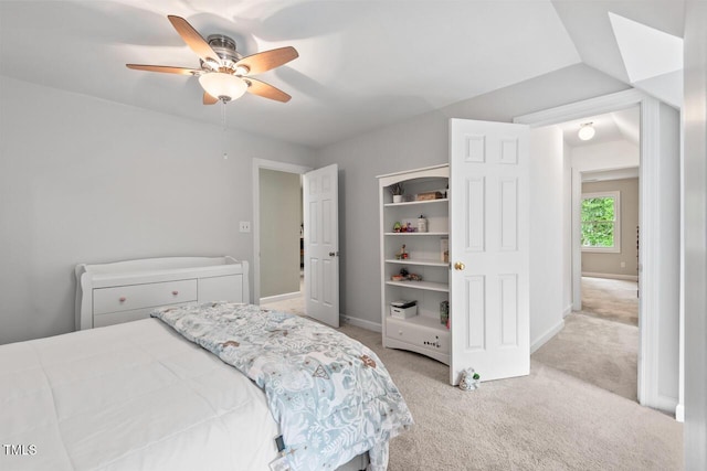 bedroom with light carpet, baseboards, and ceiling fan