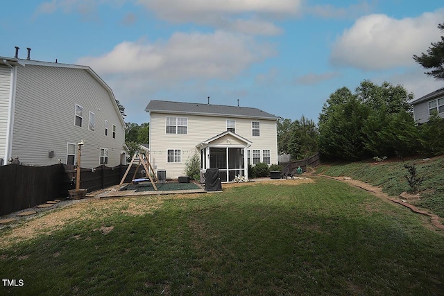 back of house with a sunroom