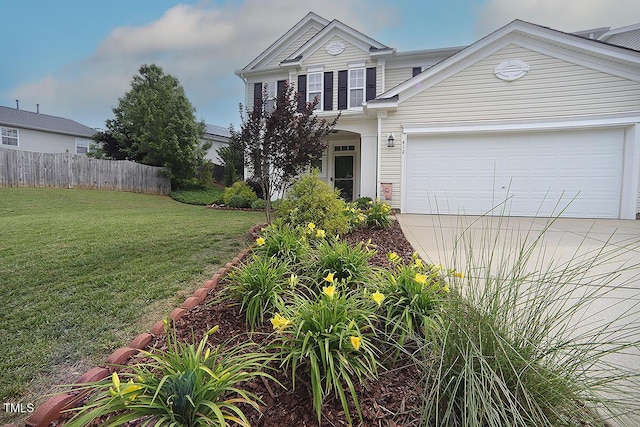 traditional home with driveway and an attached garage