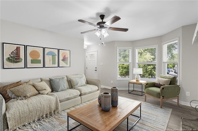 70 Oregon Ln, Spring Lake, NC 28390 - living room featuring ceiling fan, baseboards, and wood finished floors