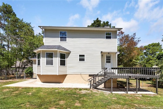 70 Oregon Ln, Spring Lake, NC 28390 - back of house featuring a patio, a yard, a wooden deck, and stairs