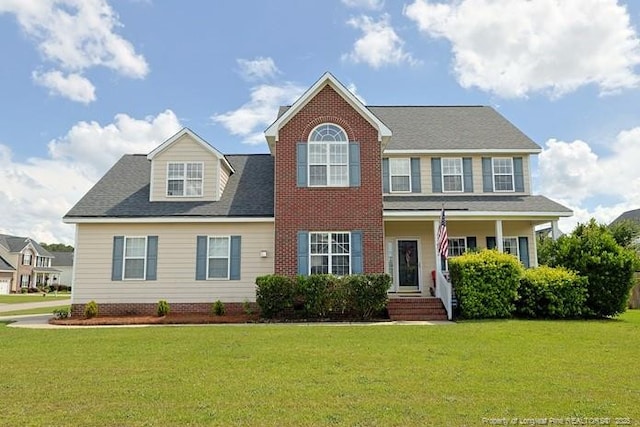 3603 Talus Rd, Fayetteville, NC 28306 - colonial home featuring a front yard