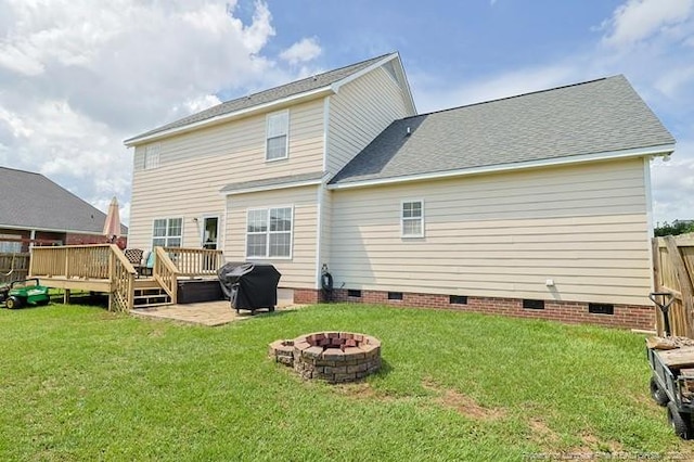 3603 Talus Rd, Fayetteville, NC 28306 - rear view of house featuring crawl space, a fire pit, and a wooden deck