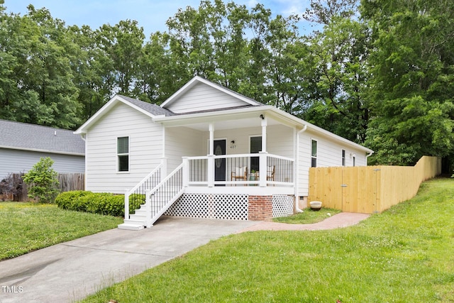 view of front of property featuring covered porch