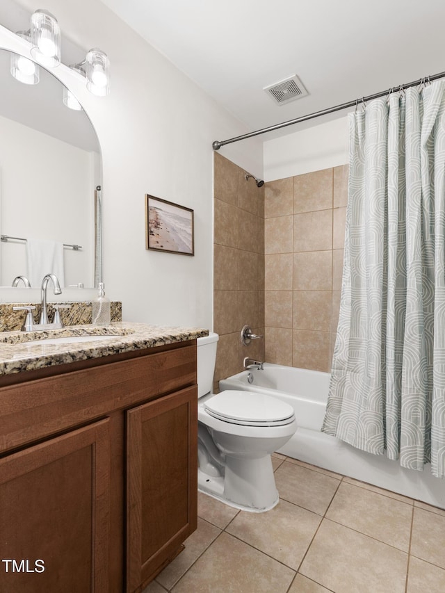 bathroom featuring tile patterned flooring, shower / bath combination with curtain, toilet, and vanity