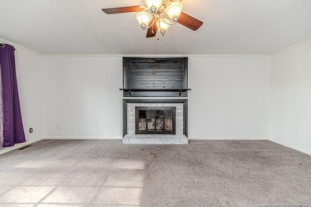 225 Lakeview Dr, Sanford, NC 27332 - unfurnished living room featuring a ceiling fan, carpet floors, a fireplace, baseboards, and ornamental molding