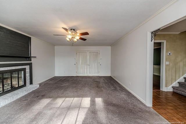 225 Lakeview Dr, Sanford, NC 27332 - unfurnished living room with ceiling fan, stairway, a brick fireplace, ornamental molding, and baseboards