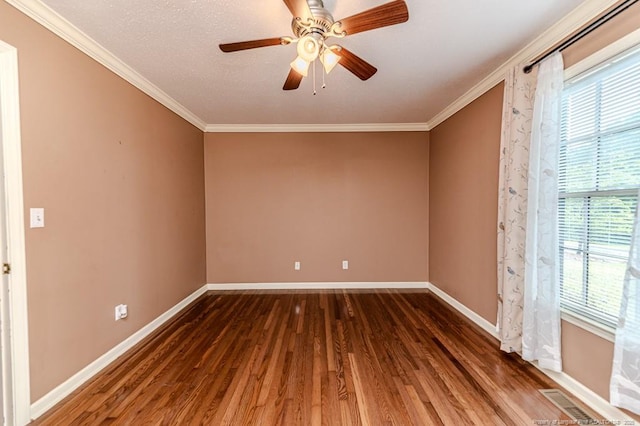 225 Lakeview Dr, Sanford, NC 27332 - spare room with wood finished floors, baseboards, ornamental molding, and a ceiling fan