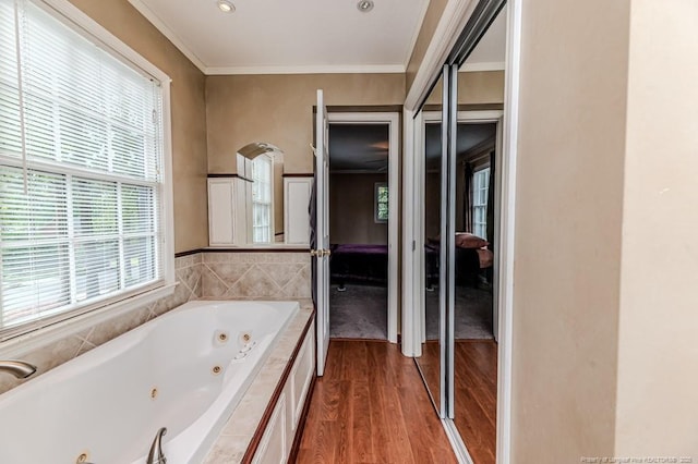 225 Lakeview Dr, Sanford, NC 27332 - full bath featuring wood finished floors, a tub with jets, ensuite bathroom, ornamental molding, and recessed lighting