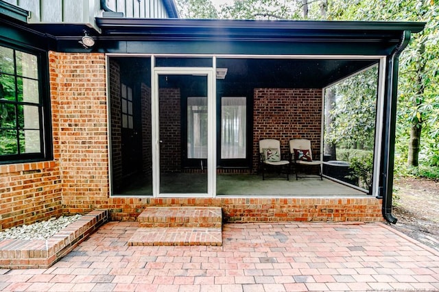 225 Lakeview Dr, Sanford, NC 27332 - view of patio featuring a sunroom